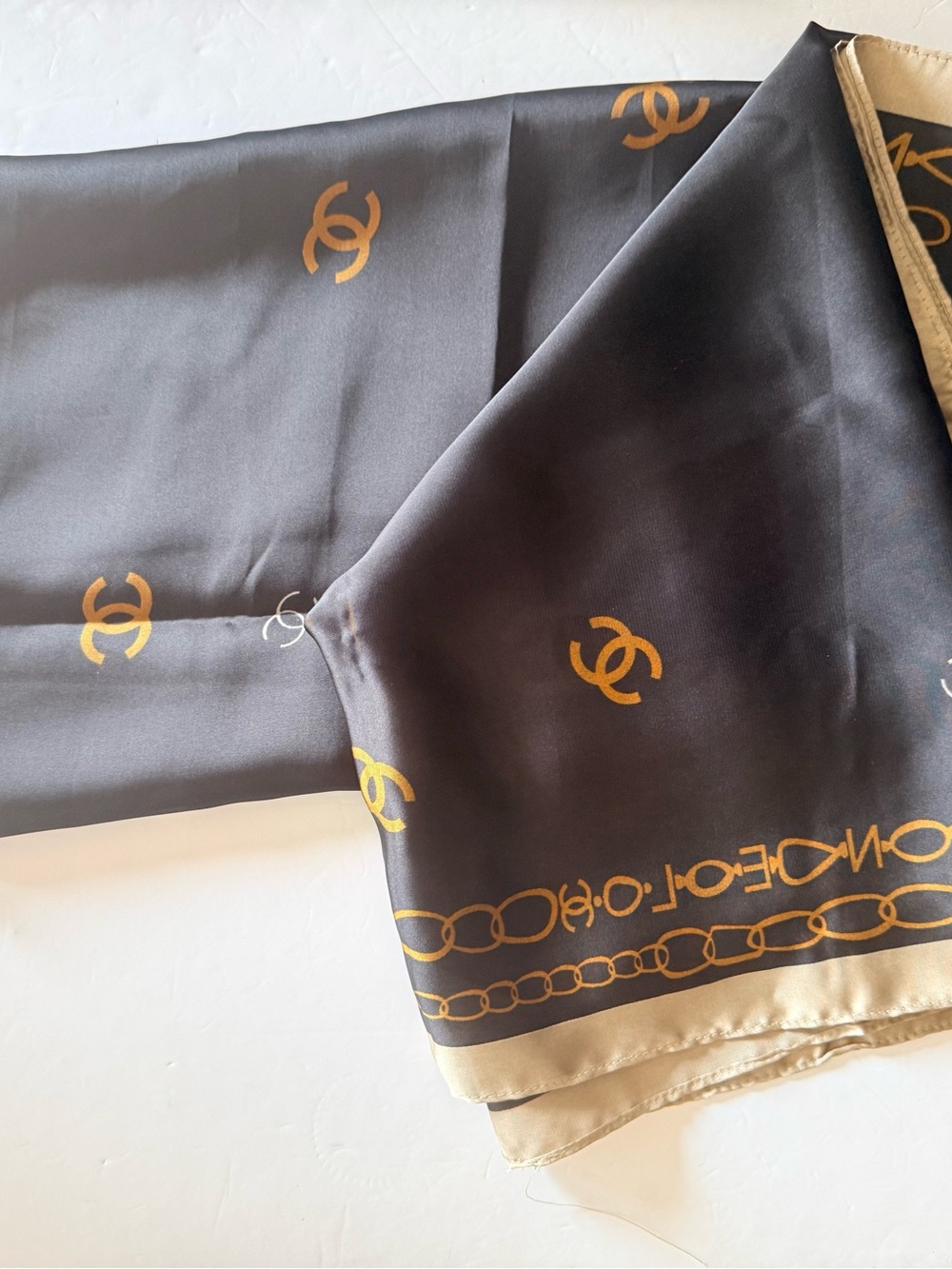 CHANEL Black and Gold Silk Logo Scarf